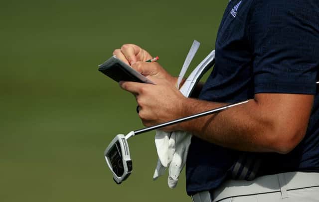 Marking a scorecard under the World Handicap System may still be the same but calculating an actual handicap is now a complicated process. Picture: Patrick Smith/Getty Images.