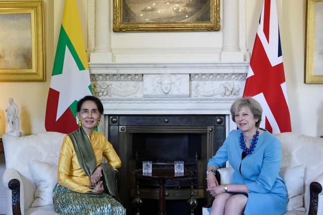 Aung San Suu Kyi meets the then Prime Minister Theresa May in Downing Street in 2016 (Picture: Facundo Arrizabalaga/PA)