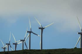 Stornoway Community Council is urging local planners to accept an offer from Scottish ministers to hold a public enquiry into proposals to build a giant wind farm on the edge of the islands' capital