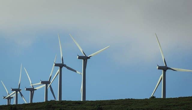 Stornoway Community Council is urging local planners to accept an offer from Scottish ministers to hold a public enquiry into proposals to build a giant wind farm on the edge of the islands' capital
