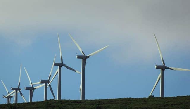 Stornoway Community Council is urging local planners to accept an offer from Scottish ministers to hold a public enquiry into proposals to build a giant wind farm on the edge of the islands' capital