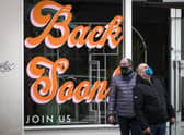 Sign that reads "Back Soon" in the window of a closed shop in Edinburgh city centre, as lockdown measures for mainland Scotland continue picture: PA/Jane Barlow