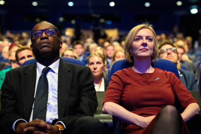 Chancellor Kwasi Kwarteng and Liz Truss have been forced to drop their plan to scrap the 45p top rate of tax (Picture: Leon Neal/Getty Images)