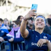 Scotland's captain Rachel Malcolm takes a selfie with young fans at the Guinness Women's Six Nations match against France at Hive Stadium.  (Photo by Ross Parker / SNS Group)