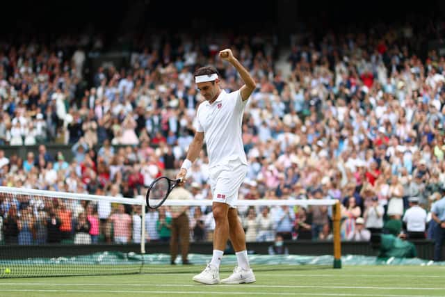 Roger Federer celebrates his Centre Court victory over Cameron Norrie