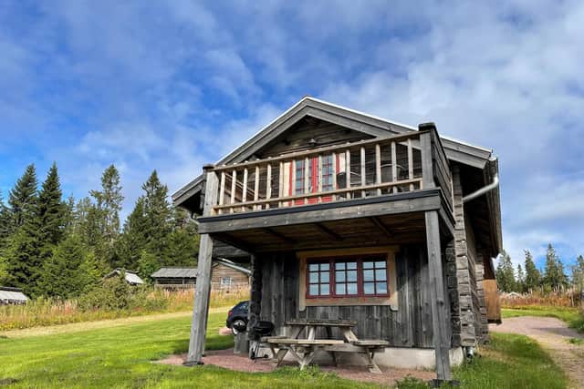 A cabin at Smidgarden in Orsa, a resort of wooden chalets favoured for its forest hiking trails outside of the snowy cross-country ski season. Pic: PA Photo/Sarah Marshall.