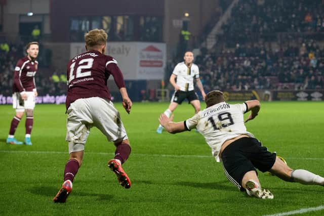 Aberdeen's Lewis Ferguson goes down inside the box and wins the penalty which upset Hearts boss Robbie Neilson. (Photo by Bruce White / SNS Group)