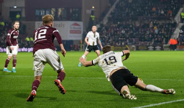 Aberdeen's Lewis Ferguson goes down inside the box and wins the penalty which upset Hearts boss Robbie Neilson. (Photo by Bruce White / SNS Group)