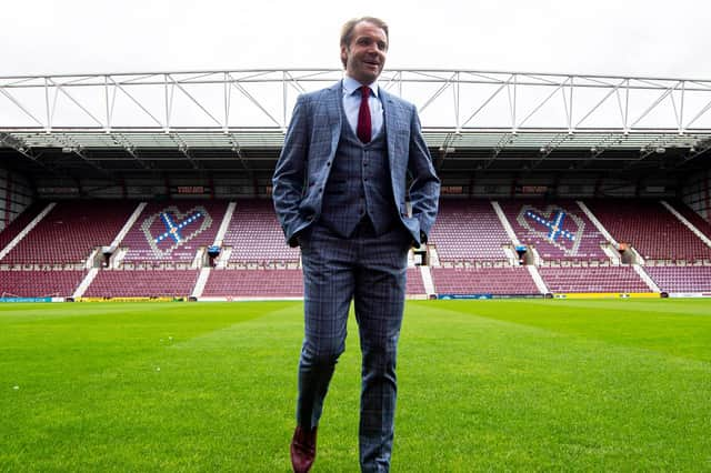 Robbie Neilson plans to look at Hearts' coaches before deciding on any changes.