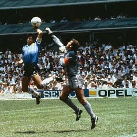 Diego Maradona's first goal against England is an iconic moment in football history. (Picture credit: Getty Images)