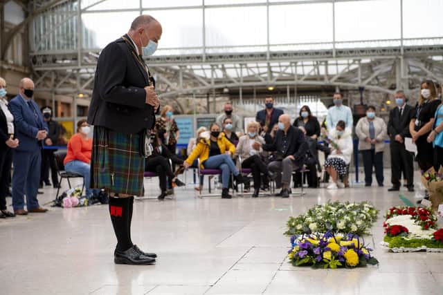 Aberdeen Lord Provost Barney Crockett laying a wreath at the city's station one week after the crash in 2020. Picture: Ross Parker/SNS/ScotRail/Pool/PA Wire