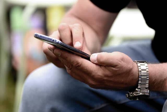A man who twice failed to provide a PIN code for his mobile phone after being stopped at Belfast International Airport has been given a suspended prison term. Picture: pixabay (generic image).