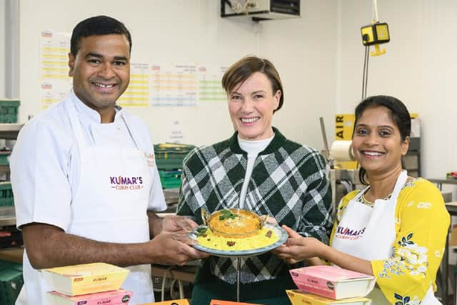 Praveen (left) and his wife Swarna (right) pictured with Ashley Connolly, Asda's Buying Manager for