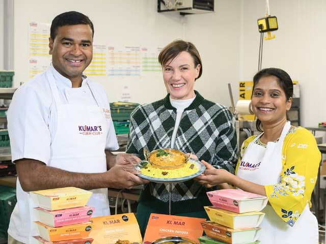 Praveen (left) and his wife Swarna (right) pictured with Ashley Connolly, Asda's Buying Manager for