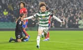 Celtic's Kyogo Furuhashi celebrates after making it 1-0 against Atletico Madrid. (Photo by Rob Casey / SNS Group)