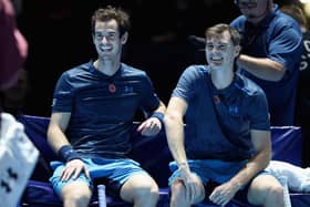 Andy Murray and Jamie Murray share a joke during their doubles match against Tim Henman and Mansour Bahrami during Andy Murray Live at The Hydro on November 7, 2017 in Glasgow. Picture: Steve Welsh/Getty Images for Andy Murray Live