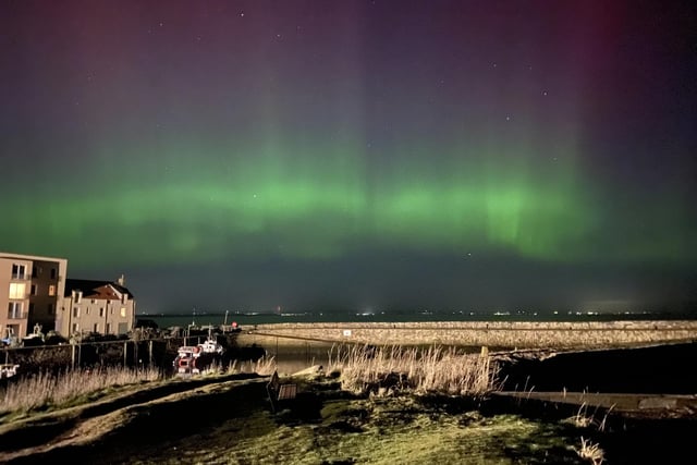 Handout photo taken with permission from the twitter account of @StLeonards_Head of the northern lights over St Andrews in Scotland. Picture date: Monday February 27, 2023.