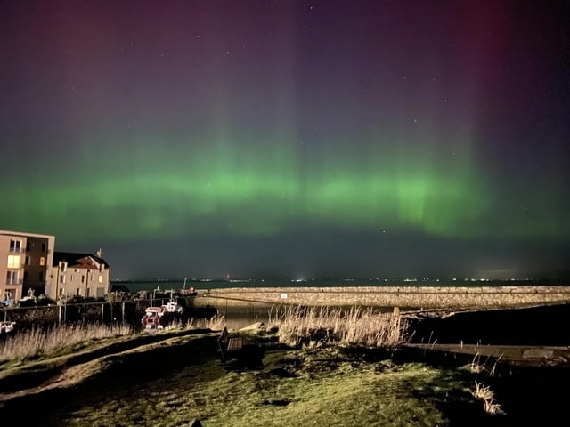 Handout photo taken with permission from the twitter account of @StLeonards_Head of the northern lights over St Andrews in Scotland. Picture date: Monday February 27, 2023.