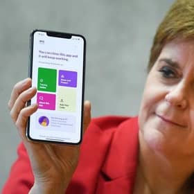 The Protect Scotland app will alert people when they have been in close contact with someone who later tests positive. (Photo by Jeff J Mitchell/Getty Images)