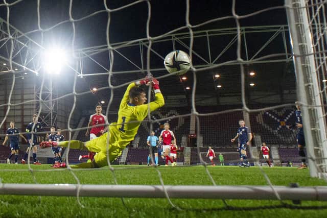 Denmark's Gustav Isaksen scores the opening goal during the UEFA Under-21 Championship Qualifier match between Scotland and Denmark at Tynecastle Stadium on October 07, 2021, in Edinburgh, Scotland. (Photo by Craig Foy / SNS Group)