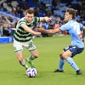 Celtic's Anthony Ralston is challenged by Jake Girdwood-Reich of Sydney FC during the Sydney Super Cup match at Allianz Stadium. (Photo by Mark Evans/Getty Images)