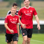 ABERDEEN, SCOTLAND - JULY 20: Dylan McGeouch (left) and Declan Gallagher are pictured during an Aberdeen Training session at Cormack Park on July 20, 2021, in Aberdeen, Scotland.  (Photo by Ross MacDonald / SNS Group)