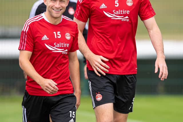 ABERDEEN, SCOTLAND - JULY 20: Dylan McGeouch (left) and Declan Gallagher are pictured during an Aberdeen Training session at Cormack Park on July 20, 2021, in Aberdeen, Scotland. (Photo by Ross MacDonald / SNS Group)