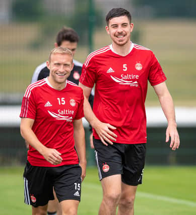 ABERDEEN, SCOTLAND - JULY 20: Dylan McGeouch (left) and Declan Gallagher are pictured during an Aberdeen Training session at Cormack Park on July 20, 2021, in Aberdeen, Scotland.  (Photo by Ross MacDonald / SNS Group)