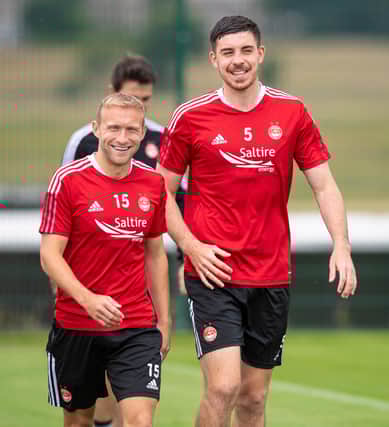 ABERDEEN, SCOTLAND - JULY 20: Dylan McGeouch (left) and Declan Gallagher are pictured during an Aberdeen Training session at Cormack Park on July 20, 2021, in Aberdeen, Scotland. (Photo by Ross MacDonald / SNS Group)