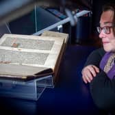 Head of rare books Helen Vincent with the National Library's copy of the Gutenberg Bible, which is going on display in its new Treasures gallery. Picture: Neil Hanna