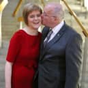 File photo dated 19/11/14 of the then SNP leader Nicola Sturgeon is given a kiss by her husband Peter Murrell at the Scottish Parliament in Edinburgh, after she was voted in as First Minister of Scotland. Former first minister of Scotland Nicola Sturgeon and former SNP chief executive Peter Murrell have "decided to end" their marriage, she said in a post on social media. Issue date: Monday January 13, 2025.