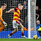 Partick's Scott Tiffoney is initially prevented from walking the ball into the net by Rangers goalkeeper Allan McGregor. (Photo by Craig Williamson / SNS Group)