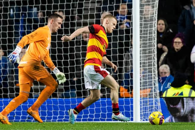 Partick's Scott Tiffoney is initially prevented from walking the ball into the net by Rangers goalkeeper Allan McGregor. (Photo by Craig Williamson / SNS Group)