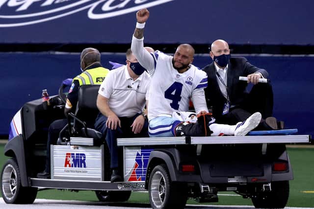 Cowboys QB Dak Prescott is carted off the field.