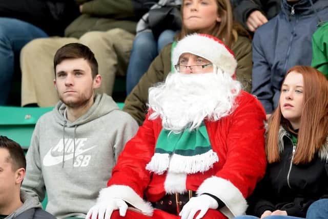 A Hibernian supporter embracing the festive spirit during a match against Raith Rovers at Easter Road on December 24, 2016 - the last time league fixtures were scheduled on Christmas Eve. (Photo by Bill Murray/SNS Group).