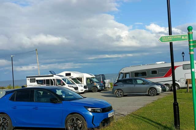 Motorhome users at a Highland Council carpark at Golspie, where there are four designated spaces. Meanwhile, established caravan parks are struggling to attract visitors.