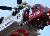 A coastguard helicopter was involved in the rescue (Andrew Milligan/PA) (PA Archive)