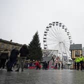 Police officers on patrol at the Christmas market in Nottingham which has been shut temporarily after large crowds gathered at the attraction on Saturday.