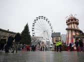Police officers on patrol at the Christmas market in Nottingham which has been shut temporarily after large crowds gathered at the attraction on Saturday.