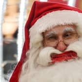 Santa Claus may have to wear a face mask and stay socially distanced but we can still celebrate Christmas (Picture: Bob Edme/AP)