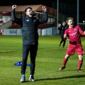 BRORA, SCOTLAND - MARCH 23: Brora manager Steven MacKay and his players celebrate.