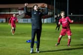 BRORA, SCOTLAND - MARCH 23: Brora manager Steven MacKay and his players celebrate.