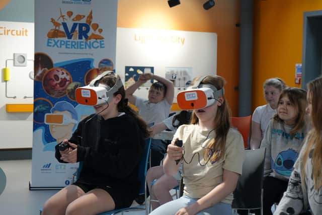 Children enjoying VR experiences at Aberdeen Science Centre