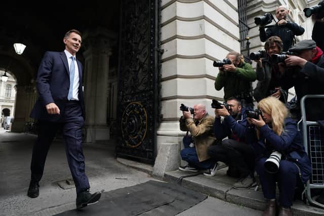Jeremy Hunt arrives in Downing Street in London after he was appointed Chancellor of the Exchequer following the resignation of Kwasi Kwarteng. Picture date: Friday October 14, 2022.