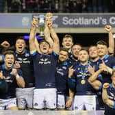 Scotland players celebrate lifting the Doddie Weir Cup after victory over Wales at Murrayfield on matchday two of the 2023 Guinness Six Nations. (Photo by Craig Williamson / SNS Group)