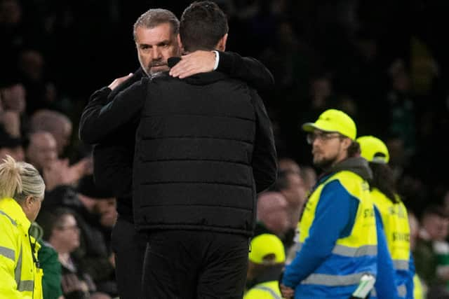 Celtic manager Ange Postecolgou embraces Dundee United's Liam Fox at the conclusion of the 4-2 win delivered by two late goals for the Scottish champions in November, with the Australian understanding of the vagaries faced by all those in his domain.(Photo by Craig Foy / SNS Group)