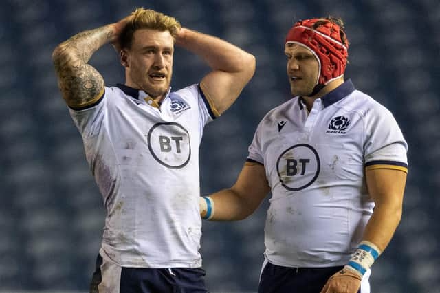 Scotland captain Stuart Hogg is consoled at full time after his late penalty error. Picture: Ross Parker / SNS