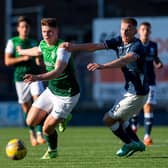 Hibs striker Kevin Nisbet looks to give Liam Dick of Raith Rovers the slip during Iain Davidson's testimonial at Stark's Park