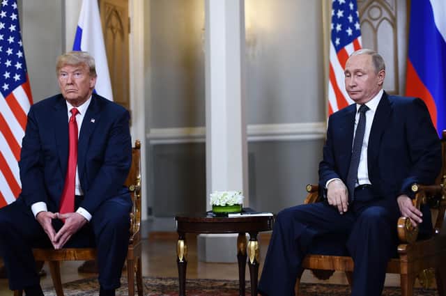 Donald Trump tried to emulate Russian president Vladimir Putin by destroying democracy but failed (Picture: Brendan Smialowski/AFP via Getty Images)