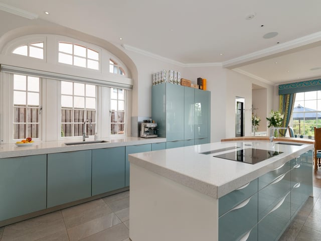 Interior: There is a lounge, open-plan kitchen and dining room, plus a double bedroom downstairs. The first floor features an impressive home cinema, drawing room, and main ensuite bedroom. The third storey contains four bedrooms.